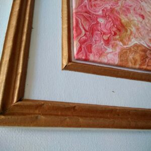 Tableau encadré rose et or